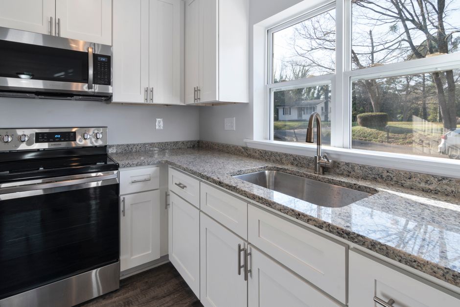 Home interior with white cabinetry and modern fixtures