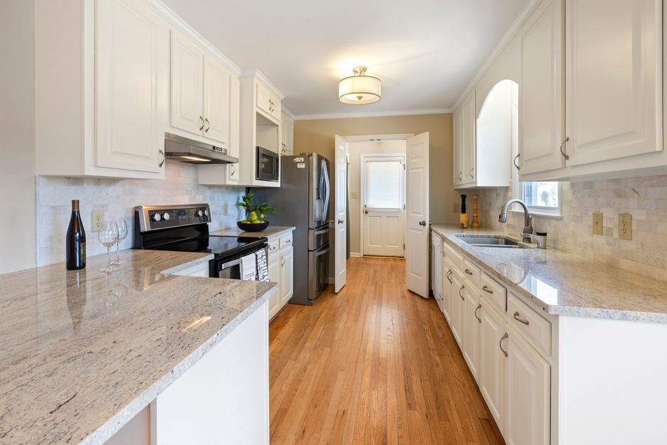Tidy home interior with light cabinetry and bright daylight